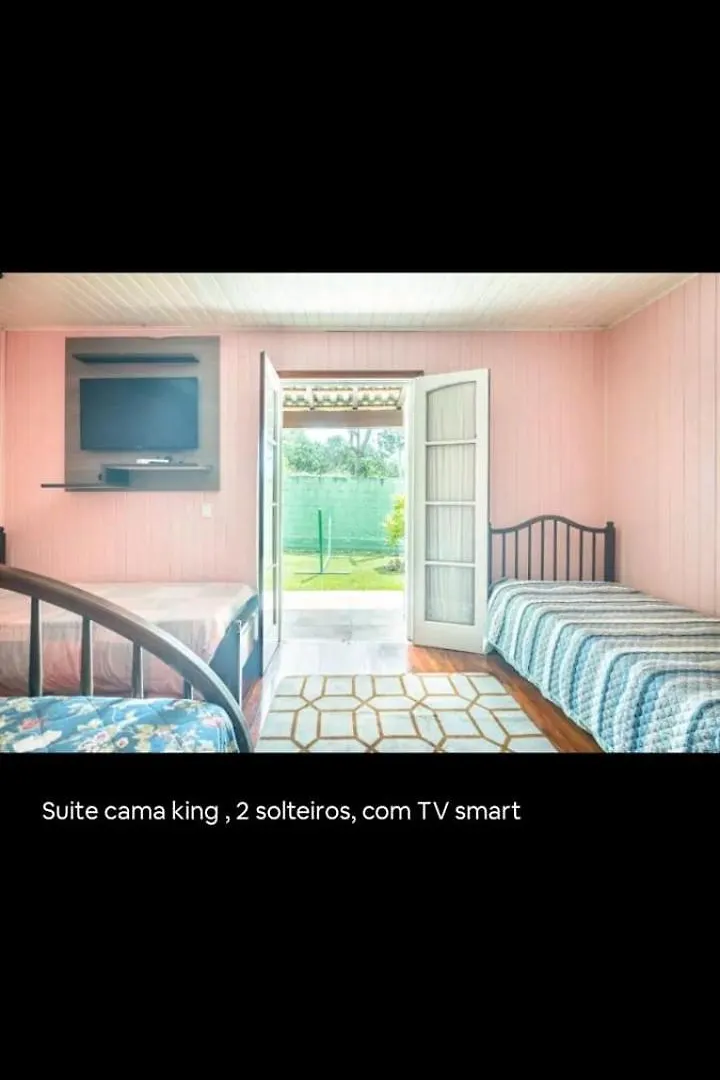Quarto em Acomodações Particulares Suites E Quartos Casa Papai Noel Campos do Jordão Brasil
