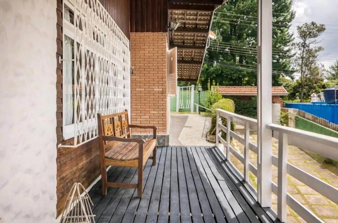 Quarto em Acomodações Particulares Suites E Quartos Casa Papai Noel Campos do Jordão